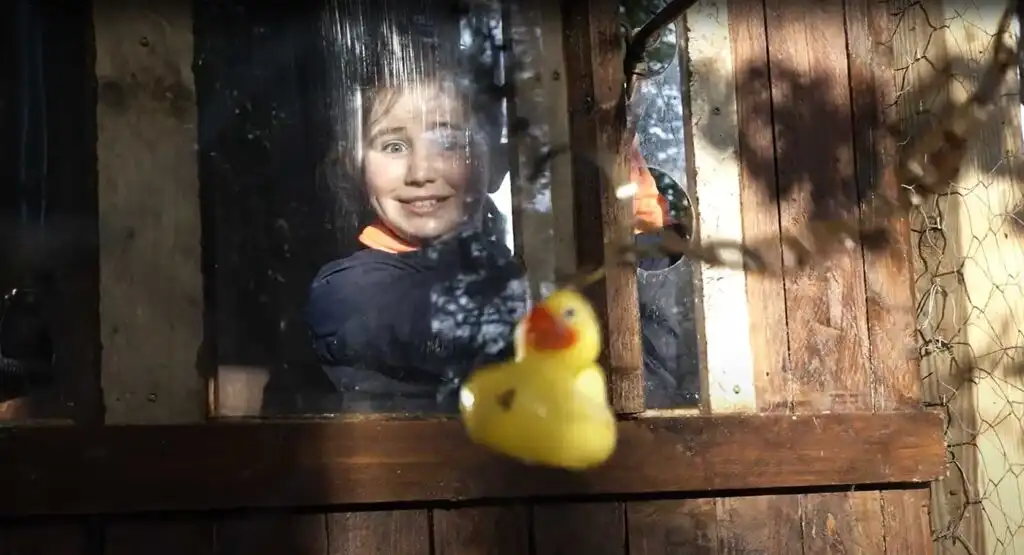 Participants gathered around a campfire at Fota Island Adventure, enjoying the evening.