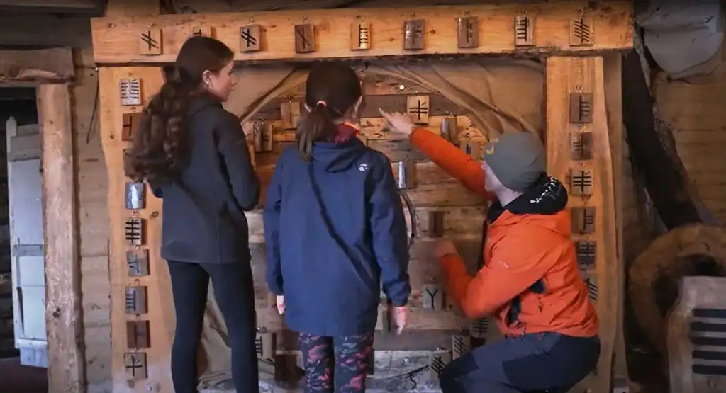 Scenic view of the lake at Fota Island Adventure, reflecting the surrounding trees and sky.