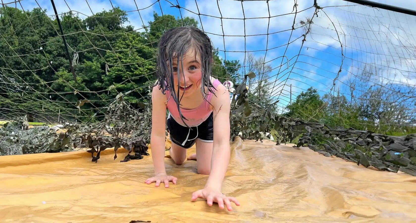 Children gathered around a campfire at Fota Island Adventure camp