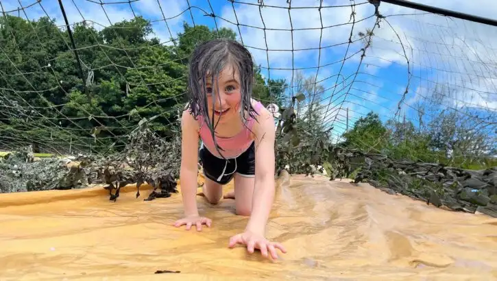 Children gathered around a campfire at Fota Island Adventure camp
