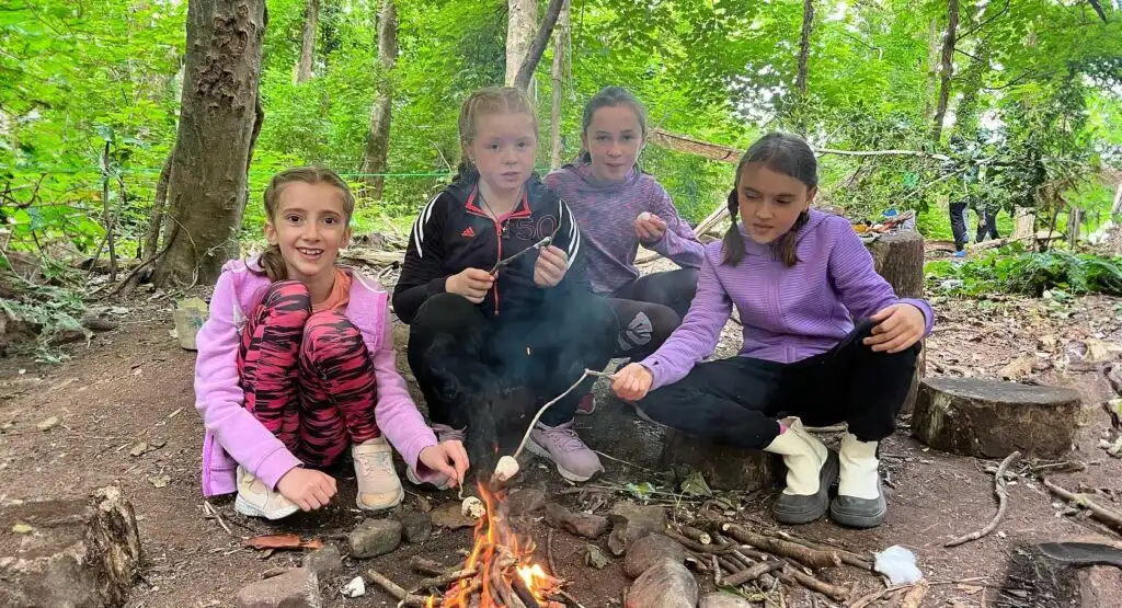 Campers enjoying a zip line ride at Fota Island Adventure