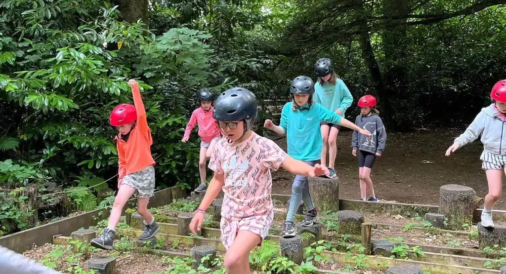Campers kayaking on a serene lake at Fota Island Adventure
