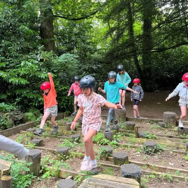 Campers kayaking on a serene lake at Fota Island Adventure