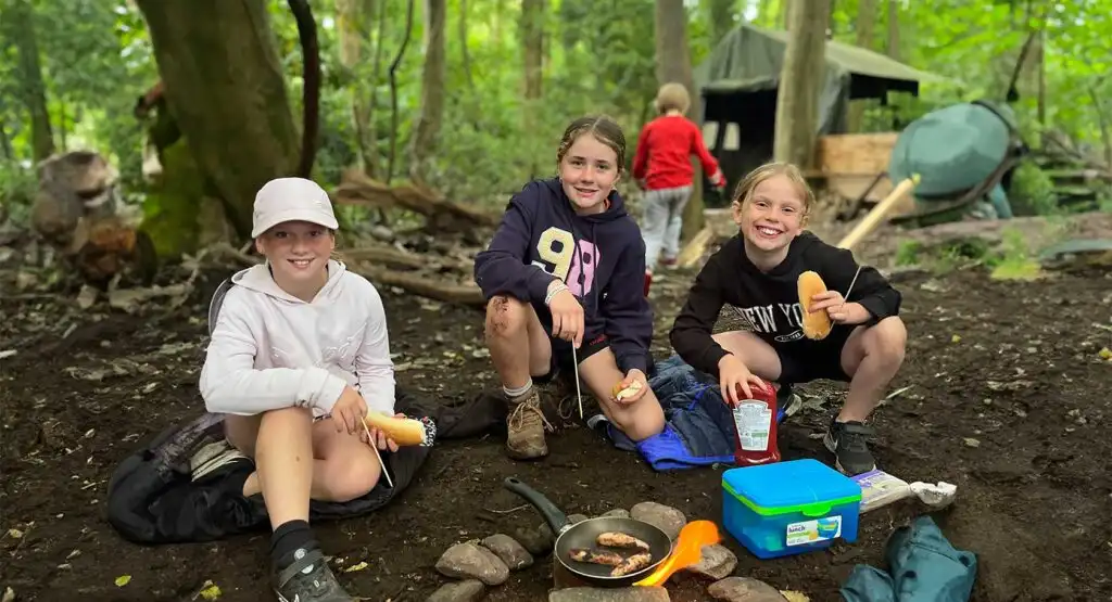 Group of children learning archery at Fota Island Adventure camp
