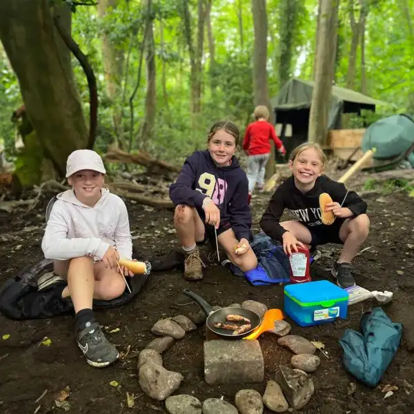 Group of children learning archery at Fota Island Adventure camp