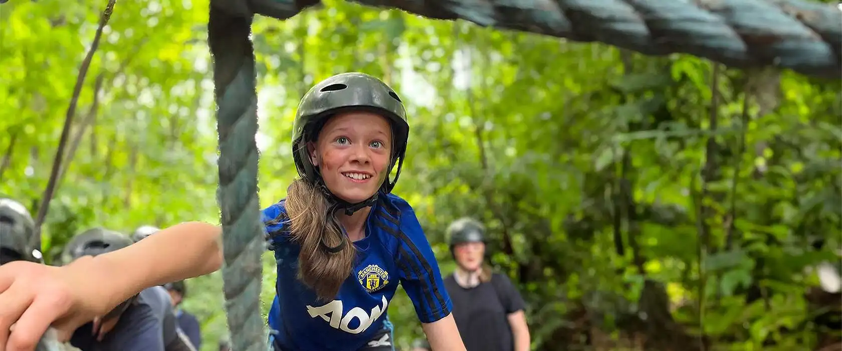 Campers kayaking on a lake at Fota Island Adventure