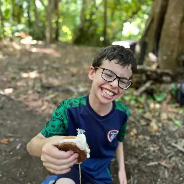 Campers kayaking on a serene lake at Fota Island Adventure