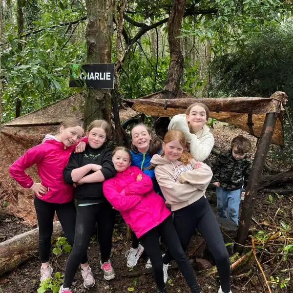 A family playing a game of archery at Fota Island Adventure