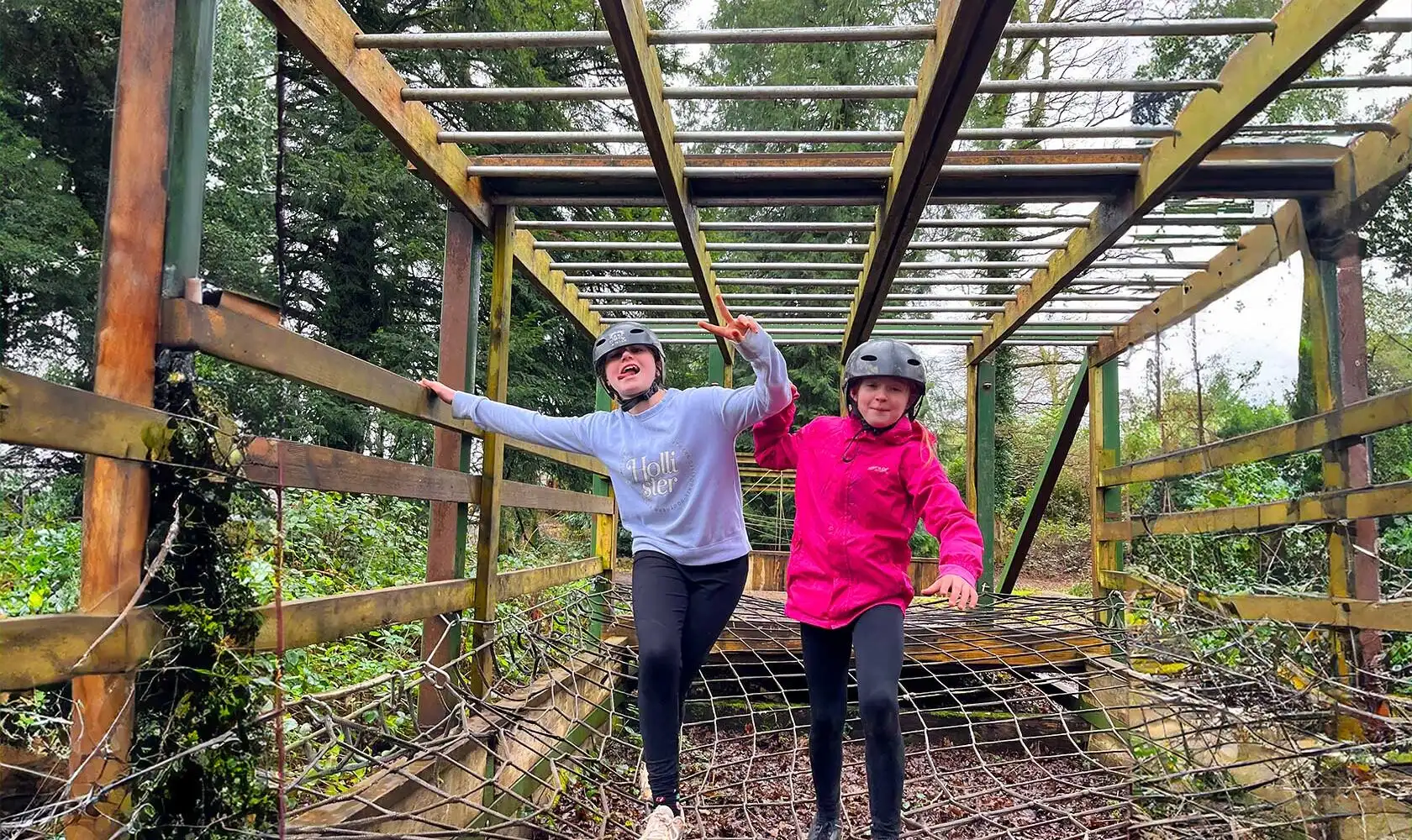 Aerial view of a group of friends kayaking through a scenic waterway at Fota Island Adventure, surrounded by lush greenery
