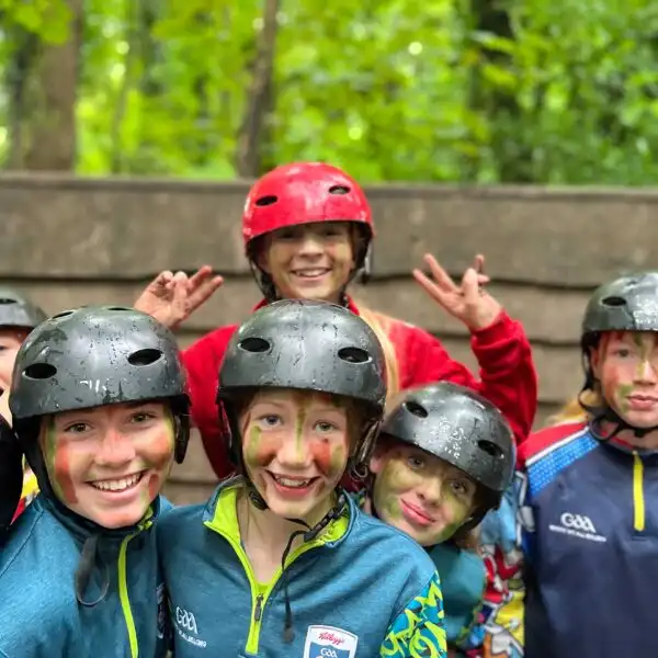 Family riding bicycles on a trail at Fota Island Adventure