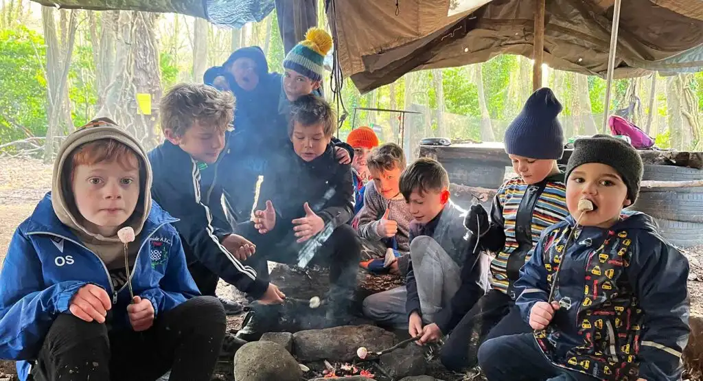 Children playing in a water obstacle course at Fota Island Adventure