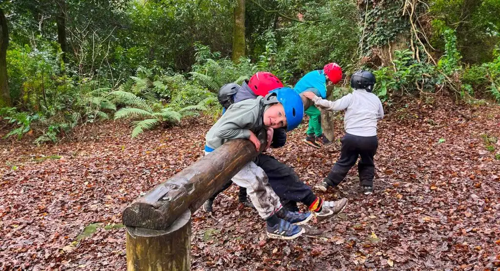 Family participating in a team-building exercise at Fota Island Adventure