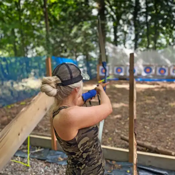 Group of stags and hens participating in a team-building exercise at Fota Island Adventure