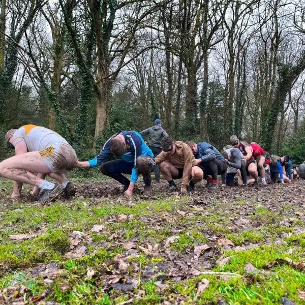 Colleagues at Fota Island Adventure working together on a creative project, fostering collaboration and creativity.