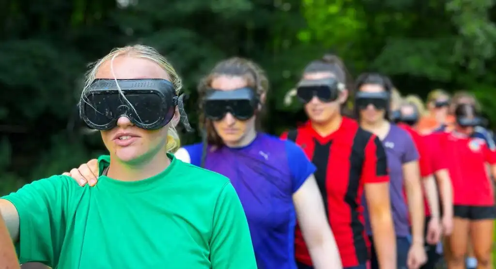 Colleagues at Fota Island Adventure participating in a team-building exercise that involves strategic planning and execution.