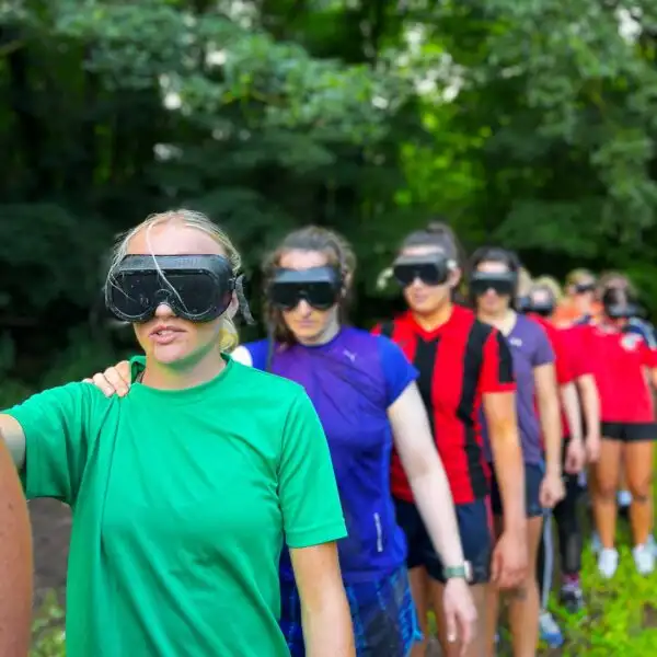 Colleagues at Fota Island Adventure participating in a team-building exercise that involves strategic planning and execution.
